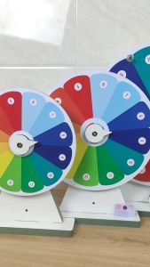 Vòng quay may mắn 12 ô bông hoa trúng thưởng họa tiếc đa sắc làm sự kiện xổ số chương trình sale khuyến mãi