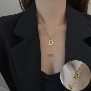 Trendy Women's Fashion: Stylish Jewelry Design Featuring Stainless Steel Initial Pendant & Vintage Gold Tassel Necklace