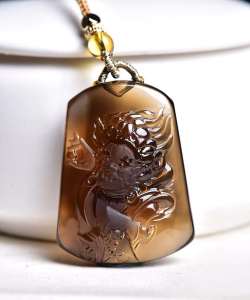 Pure natural tea topaz big black heaven God of wealth pendant super beautiful color exquisite carving. The guardian God is the god of medicine and wealth. Bless peace and health! Dimensions: 403014 mm