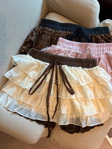 GUZILIAN | Slim Waist Tied Lace Bow Decorated Short Skirt