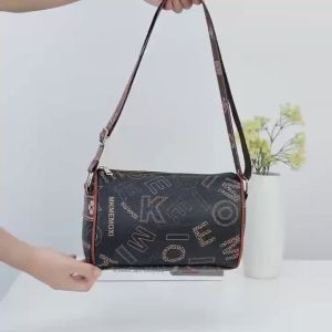 CATHERINE BAGS#1162 Korean monogram print shouldercrossbody bag cylindrical shape and wide adjustable shoulder strap.