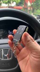 Tay khóa điều khiển cửa cuốn - Remote điều khiển từ xa 433Mhz mã copy - Smart key thời trang kèm pin