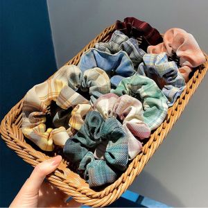 แฟชั่นเกาหลี S Crunchie สำหรับผู้หญิง JK ตารางผมแหวนลูกอมสีผมผูกลำไส้ขนาดใหญ่หัวเชือกผ้าที่นิยมลายสก๊อตผมเชือกที่เรียบง่ายยางรัดสำหรับสาวอุปกรณ์ผม