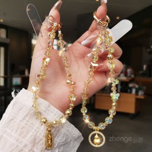 สร้อยคอโทรศัพท์มือถือแบบทำมือดีไซน์เรียบง่ายพร้อมจี้คริสตัล เคสโทรศัพท์มือถือแบบแขวนแขนสำหรับการเดินทางกลางแจ้งและเที่ยวชมเมือง