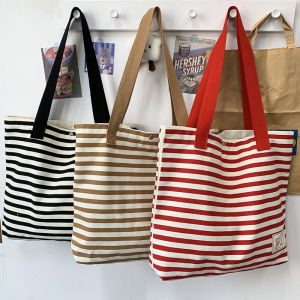 กระเป๋าผ้าใบลายทางคลาสสิกสำหรับเดินทางไปทำงาน ความจุขนาดใหญ่ กระเป๋าสะพายไหล่ผู้หญิง กระเป๋าผ้าใบแบบพกพาทันสมัย ​​วัสดุผ้าใบ