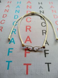 Gelang Liontin sayap angel Model serut /Rantai anti karat/Tali kulit hitam 1mm serut /Bisa couple