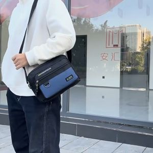 PIYU แฟชั่นกระเป๋าสะพายไนล่อนผู้ชายใหม่กระเป๋าสะพายแนวนอนผู้ชายหลายชั้นกระเป๋าสะพายไหล่แฟชั่นความจุสูง