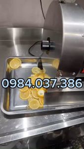 Máy cắt rau củ dạng lát mỏng chạy điện
