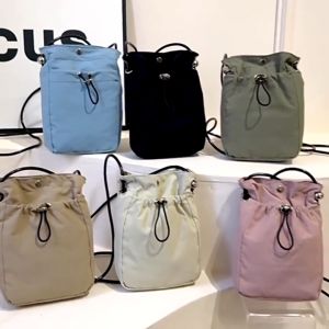 myspaceshop(M2107) กระเป๋าสะพายข้างใบเล็ก ผ้าไนล่อนทรงถุง