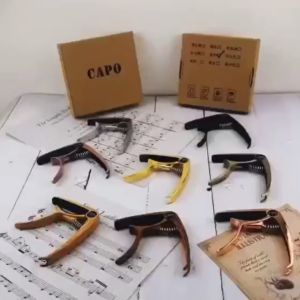 🎸 คาโป้กีต้าร์ CP-00 | ใช้ได้ทุกประเภท (โปร่ง/ไฟฟ้า/เบส/อูคูเลเล่) | สปริงแรงหนีบแน่น ปรับระดับได้ | แถมฟรีปิ๊กกีต้าร์