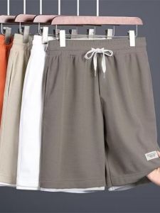 กางเกงขาสั้นทรงหลวมบางฤดูร้อนสำหรับผู้ชาย กางเกงขายาวทรงตรงลำลองสไตล์ใหม่ เอวกลาง ระบายอากาศได้ดี ผ้าโพลีเอสเตอร์ กางเกงขายาวลำลองสำหรับเยาวชน