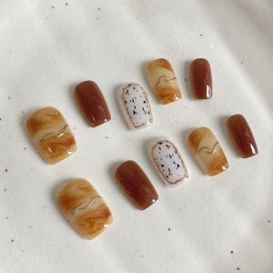 เล็บปลอมทรงสี่เหลี่ยมสั้นแบบกดด้วยมือ 10 ชิ้น งานศิลปะบนเล็บสวยงาม สีคาราเมลโทนอุ่น เหมาะสำหรับผู้หญิง