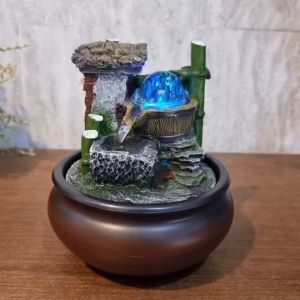 น้ำล้นตั้งโต๊ะ รุ่นไผ่มงคล น้ำพูดเล็ก และเป็นน้ำพูดเพียงพอที่โต๊ะ หมุนเสริมฮวงจุ้ย เป็นของขวัญ มีลูกแก้วกับเครื่องดื่มที่นอนหลับ