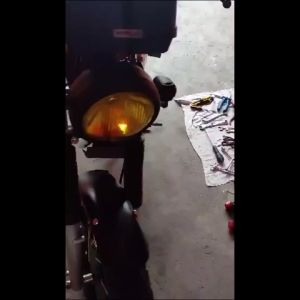 Round Yellow Headlamp: A No Grill Motorcycle Lighting Accessory