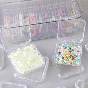 ตู้บรรจุกล่องพลิกพลาสติกกล่องใส่ของแบบใสลูกปัดสีขาวสำหรับจัดเก็บ DIY อุปกรณ์เสริมจิวเวลรี่