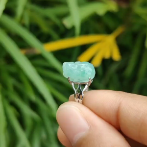 Newly Listed - SG Local Seller - Crafted as Light Green Hue Pixiu on High Quality Natural Type A Jadeite Jade set with S925 as adjustable Ring certificate weighs 2.27 grams measurement 11.8 * 8 * 5 mm (s925ring26)