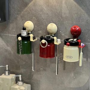 ตู้ครีมแปรงสีฟันแบบดูดซับผนัง ชามล้างปากดูดซับแม่เหล็ก จัดระเบียบในห้องน้ำแบบไม่ต้องเจาะ แก้วดื่มน้ำสำหรับใช้ในครัวเรือน