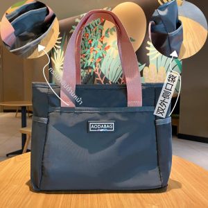 กระเป๋าเป้สะพายหลังแบบถือสำหรับเดินทางแบบลำลองสำหรับผู้ชายและผู้หญิง กระเป๋าใส่อาหารกลางวันแบบกันน้ำ กระเป๋าถือขนาดเล็กแบบปิดด้วยซิป