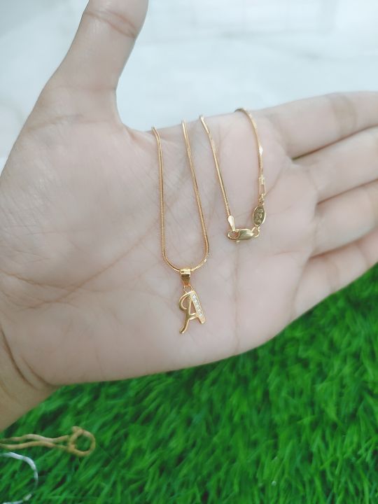 KALUNG%20PERAK%20ASLI%20SILVER%20925%20LAPIS%20EMAS/KALUNG%20KASANDRA%20FLEXY+LIONTIN%20HURUF%20LATIN%20MP%201%20BRS/ASLI%20SILVER/FASHION%20WANITA%20TERBARU%20-%20Image%209