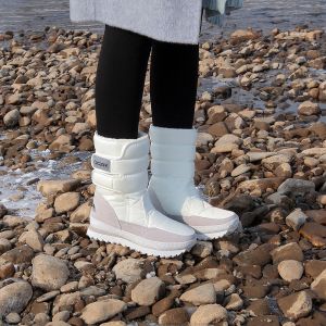 รองเท้าบูทกันน้ำหนาสำหรับใส่กลางแจ้งในฤดูหนาว ป้องกันการลื่นและตกปลิว รองเท้าผ้าใบแบบสวมสำหรับผู้หญิง ด้านบนทำจากขนสัตว์ผสมผ้าฝ้าย