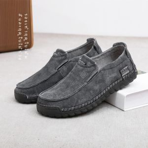 ลำลอง รองเท้าผ้าใบผู้ชายแท้ ระบายอากาศได้ดี รองเท้าส้นเตี้ยสวมหัวกลมดูดซับเหงื่อ หนัง ด้านบน