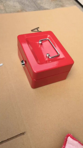 Metal Money Box With Dividers For Coin Sorting And Banknote Storage Home Organizer - Red White Blue Black - Key Lock - Opened Showing Internal Compartments - Home Organizer.