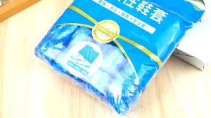 Jin.Lucky ถุงคลุมรองเท้าพลาสติก แบบสั้น กันน้ำ มีความยืดหยุ่นได้ดี 50คู่ /100ชิ้น