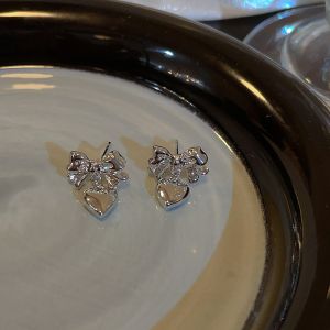 Sugar Cool Butterfly Knot Heart Shaped Metal Earrings Womens Fashion Unique Cold Style Studs Fresh out Korean Style Alloy