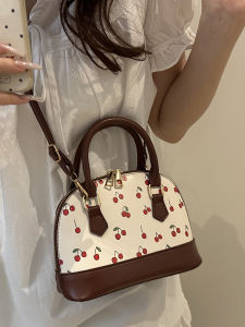 กระเป๋าสะพายข้างทรงหอยลิ้นชีสแบบสะพายข้างสำหรับฤดูร้อน กระเป๋าสะพายข้างหนัง PU ขนาดเล็กสำหรับผู้หญิง ดีไซน์เรียบง่ายและหรูหรา