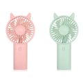 Portable Handheld AA Battery Mini Desktop Air Cooler Fans with Cat Ear Design in Pink and Green for Outdoor Travel Use. 