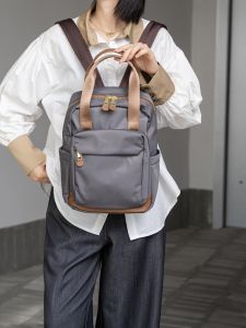 Anmoyi 2025 Oxford Cloth Leather Lightweight Travel Large Capacity High-End Computer Double Shoulder Backpack for Youth