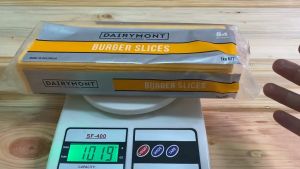 Phô mai cắt lát không màu DAIRYMONT - 1kg (84 lát)