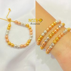 {\n    \"article\": \" Gelang Serut Mix Bola Warna Motif Lapis Emas Perhiasan Fashion