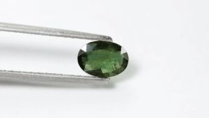 0.80 ct พลอยแท้ เขียวส่อง เผาเก่า ทรงไข่ บางกะจะ จันทบุรี