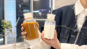 Elegant Transparent Straw Glass Bottle: A Stylish & Practical Choice