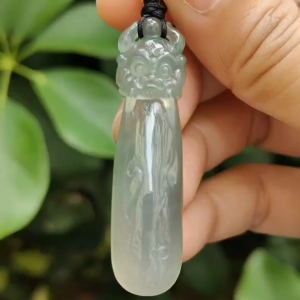 Crafted as Mystic Beast Pendant on High Quality Natural Type A Jadeite Jade certificate weighs 9.38 grams measurement 48.8 * 12.7 * 8.8 mm (pendant371)