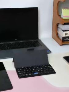 JOMAA | Mini Foldable Bluetooth Keyboard for Samsung iPadPortable Ultra-Slim Travel Keyboard with Leather Cover for Windows iOS Mac