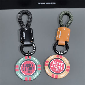 สร้อยคอจี้กุญแจรถยนต์หนังวัวระดับไฮเอนด์สำหรับคู่รัก สร้อยคอจี้กระเป๋าผู้ชายแบบมีเอกลักษณ์เฉพาะตัว โซ่เชือก โลหะผสม