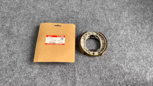 Cặp má phanh trước - sau Suzuki GD110