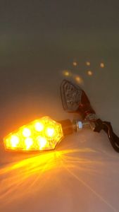 ไฟเลี้ยวมอเตอร์ไซค์ HJG-016 สีแดง ไฟสีเหลือง กรอบสีแดง ราคาขาย 1 คู่