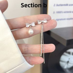 Asymmetric Tassel Pearl Butterfly Knot Earrings Womens Fashion Trend New Year Elegant Sensation Ear Jewelry Hoops