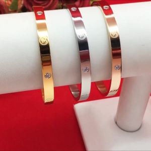 กำไลสแตนเลสคลิปล็อค ทรงกลม ลายโอม หนา 6 มิล เส้นผ่านศูนย์กลาง 5.8 ซม.ใส่เรียกทรัพย์ เสริมดวง โชคลาภ ค้าขาย พร้อมส่ง