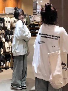 เสื้อสเวตเตอร์คอกลมแขนยาวหลวมๆ สไตล์อเมริกันย้อนยุคสำหรับผู้หญิงในฤดูใบไม้ผลิและฤดูใบไม้ร่วง เสื้อเชิ้ตแขนยาวแบบบางๆ ลำลอง