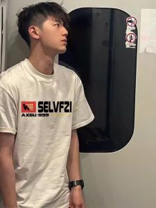 เสื้อยืดแขนสั้นพิมพ์ลายสไตล์อเมริกันสำหรับผู้ชาย ทรงหลวม สีขาว ผ้าฝ้ายแท้ ทรงหลวม ลำลอง เทรนด์ฤดูร้อน