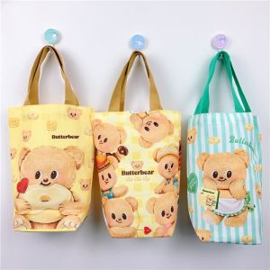 GOODOO ผ้าใบแคนวาส ฝาขวดน้ำลายหมีเนย ป้องกันรอยขีดข่วน การ์ตูนลายการ์ตูน กระเป๋าใส่ขวดน้ำ น่ารักน่ารักๆ ซองใส่ถ้วย อุปกรณ์เสริมสำหรับขวดน้ำ