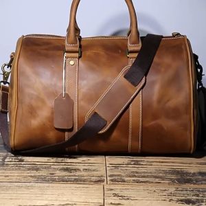 กระเป๋าผู้ชาย กระเป๋าถือ กระเป๋าสะพาย เเนววินเทจ หนังวัวเท้ หนังหนา เเบบFull Grain รับประกันหนังวัวเท้ ใช้ทน ใช้นาน