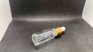 ขวด 10 มล. สีใส 6 ใบ ฝาสีทอง+บีบขาว+หลอดแก้ว 09#18