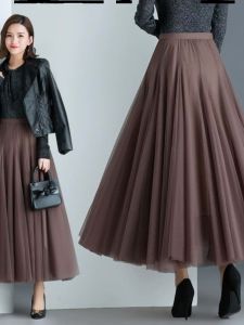 กระโปรงผ้าตาข่ายกระโปรงแบบทิ้งตัวยาวปานกลางสำหรับผู้หญิงในฤดูใบไม้ร่วงและฤดูหนาวกระโปรงจีบรอบกระโปรงยาวกระโปรงผ้าโปร่งแบบนางฟ้ากระโปรงฤดูหนาวแบบยาว