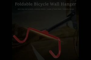 Heavy duty bike wall hanger for MTB and road bikes with red hooks and black mounting bracket.