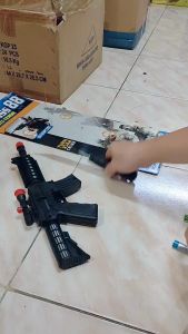 Mainan Tembakan Elektrik Anak Bunyi dan laser den88